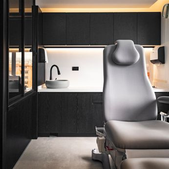 dental chair in a bright empty clinic room