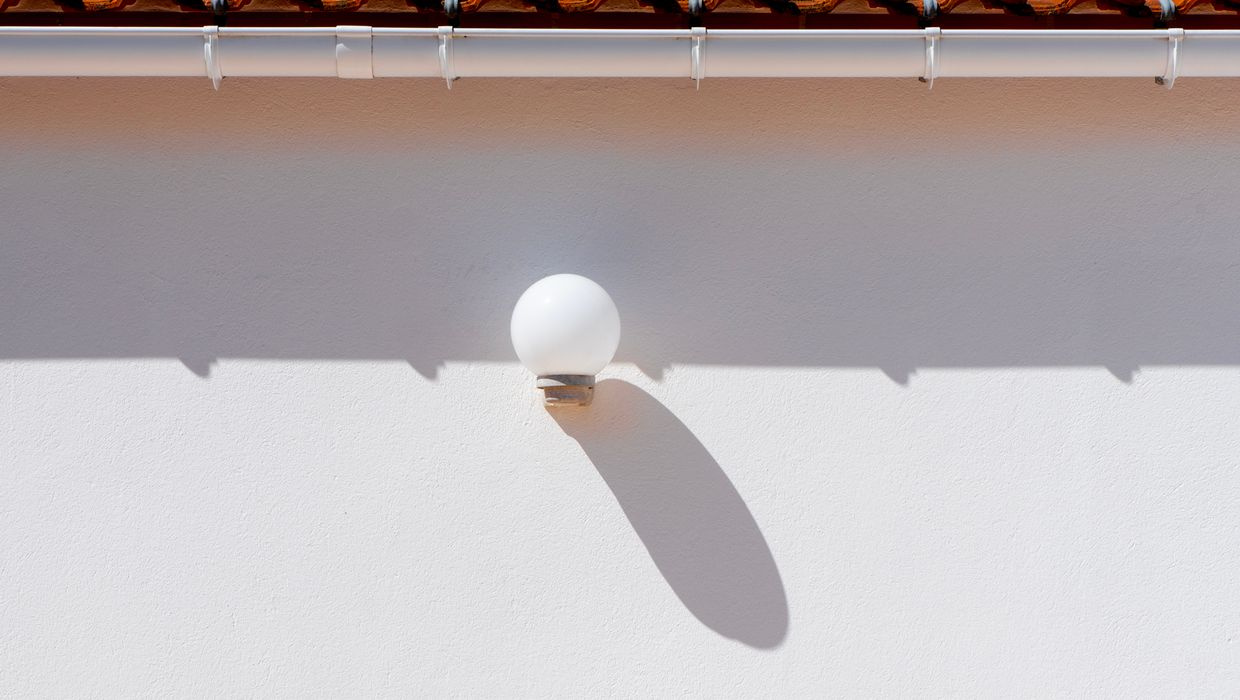 white house roof gutter downpipe