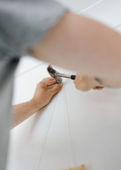 handyman hanging shelf wall