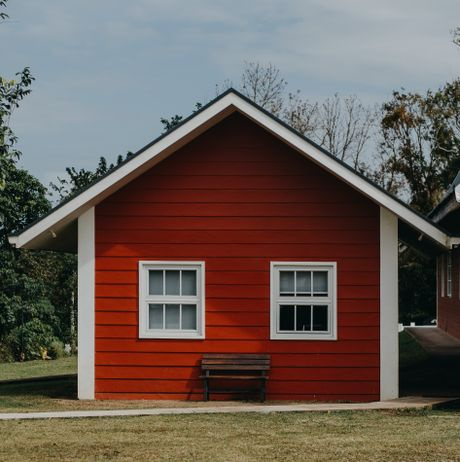 wooden siding house freshly painted