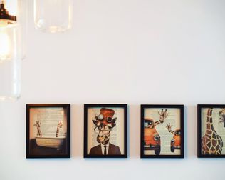 framed photo prints on a wall
