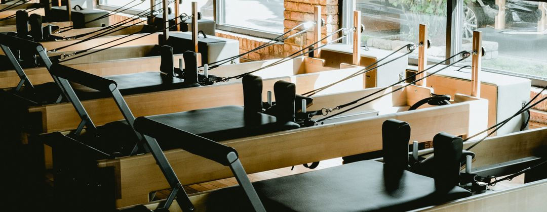 pilates studio reformer machines large windows