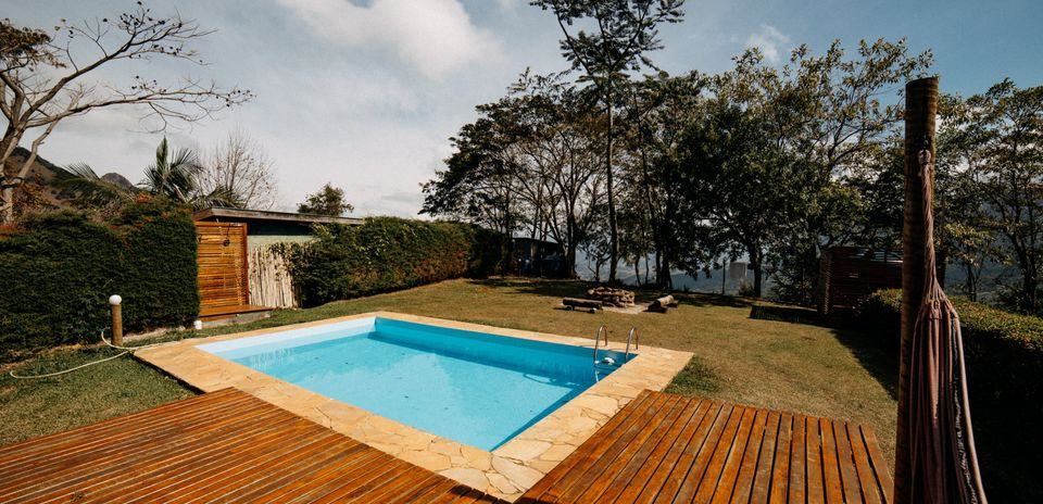 backyard swimming pool clear water