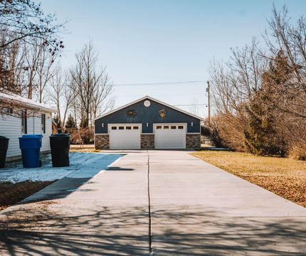 clean concrete driveway house