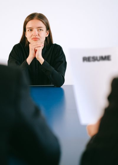 job interview across a table with resume