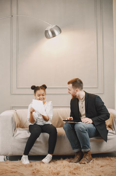 therapist and child counseling session sofa
