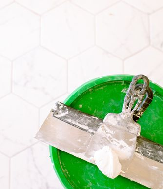 tiler laying tiles